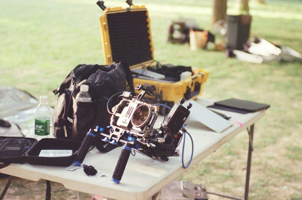 Various camera accessories on a table.